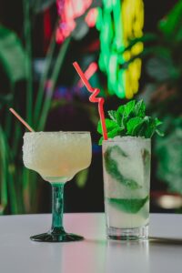 two pool cocktails on a table