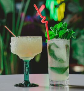 two pool cocktails on a table