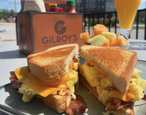 Gilroy's breakfast sandwich and mimosa.